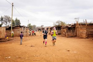 Passing Maasai settlements on Kilimanjaro Stage Run